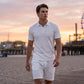 Tweedelige zomerset voor heren, bestaande uit een poloshirt en een korte broe