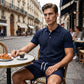Tweedelige zomerset voor heren, bestaande uit een poloshirt en een korte broe