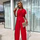 Effen gekleurde jumpsuit met hoge taille en geplooide pijpen