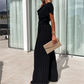 Effen gekleurde jumpsuit met hoge taille en geplooide pijpen