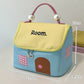 🌞Grote Capaciteit Color-Block Cartoon Huis-Vormige Handheld Cosmetische Tas😉