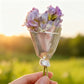 Draagbare bloemenbrochespeld
