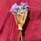 Draagbare bloemenbrochespeld