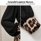 Damesjurk met V-hals en patchwork in luipaardprint
