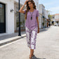 Casual set bestaande uit een tuniek met ronde hals en laagjes en een broek met wijde pijpen
