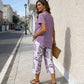 Casual set bestaande uit een tuniek met ronde hals en laagjes en een broek met wijde pijpen