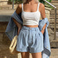 Casual denimset voor dames, bestaande uit een shirt en een korte broek